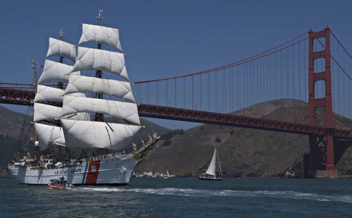 Image of the Coast Guard Cutter EAGLE near the Golden Gate Bridge.